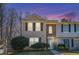 Charming two-story townhome with a well-maintained front yard and inviting entrance at 4211 Wingfoot Ct, Decatur, GA 30035