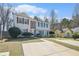 Well-manicured townhome with neutral siding, dark shutters, and a driveway leading to the entrance at 4211 Wingfoot Ct, Decatur, GA 30035