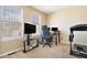Comfortable home office space filled with natural light from two large windows and neutral carpet flooring at 4211 Wingfoot Ct, Decatur, GA 30035
