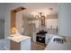 Modern kitchen featuring stainless steel appliances, white cabinets, and stylish countertops at 5072 Plantation View Trl, Stone Mountain, GA 30088