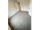 Bedroom with neutral walls and gray carpet at 5518 Legacy Trl, Douglasville, GA 30135
