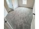Bedroom with neutral walls and gray carpet at 5518 Legacy Trl, Douglasville, GA 30135