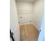 Laundry room features connections and wire shelving at 5518 Legacy Trl, Douglasville, GA 30135