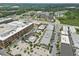 Aerial view of the Halcyon community showing the arrangement of buildings, parking, and surrounding landscape at 6460 Cortland Walk, Alpharetta, GA 30005