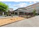 The Cherry Street Brewpub offers a welcoming outdoor space with a sandbox for the  at 6460 Cortland Walk, Alpharetta, GA 30005