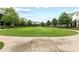 Well-maintained community lawn provides a spacious and picturesque common area for residents at 6460 Cortland Walk, Alpharetta, GA 30005