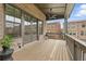 Spacious deck features outdoor seating and a barbecue grill, offering scenic neighborhood views at 6460 Cortland Walk, Alpharetta, GA 30005