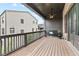 Inviting outdoor deck with cozy seating and stylish ceiling fan at 6460 Cortland Walk, Alpharetta, GA 30005