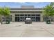 Exterior view of Halcyon's The Market Hall, featuring a modern architectural design and inviting entrance at 6460 Cortland Walk, Alpharetta, GA 30005