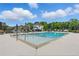 Community pool with lounge chairs and umbrellas, perfect for relaxing on sunny days at 6460 Cortland Walk, Alpharetta, GA 30005
