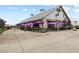 Outdoor restaurant patio with comfortable seating arrangements for an enjoyable dining experience at 6460 Cortland Walk, Alpharetta, GA 30005