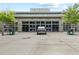Exterior view of The Market Grill, featuring a modern design and spacious entrance at 6460 Cortland Walk, Alpharetta, GA 30005
