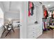 Spacious walk-in closet with built-in drawers and ample storage space at 6460 Cortland Walk, Alpharetta, GA 30005