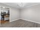 Dining room with gray walls and wood floors adjacent to kitchen at 765 Houston Mill Ne Rd # 7, Atlanta, GA 30329