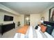 Main bedroom features a queen-sized bed, carpeted floors, dark furniture, and a wall mounted TV at 1207 Summit North Ne Dr # 1207, Atlanta, GA 30324
