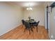 Cozy dining room offers hardwood floors, modern lighting, and a comfortable space for meals at 1207 Summit North Ne Dr # 1207, Atlanta, GA 30324