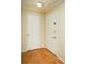 Interior hallway with hardwood floors, neutral walls, and a closet at 1207 Summit North Ne Dr # 1207, Atlanta, GA 30324