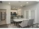 Open kitchen and dining area with granite countertops, stainless steel appliances, and room to entertain at 1207 Summit North Ne Dr # 1207, Atlanta, GA 30324
