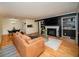 Inviting living room features a fireplace, hardwood floors, and an open layout for seamless entertaining at 1207 Summit North Ne Dr # 1207, Atlanta, GA 30324