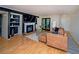 Comfortable living room boasts a cozy fireplace, hardwood floors, and access to outdoor space at 1207 Summit North Ne Dr # 1207, Atlanta, GA 30324