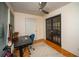 Versatile home office featuring hardwood floors, natural light, and a stylish ceiling fan at 1207 Summit North Ne Dr # 1207, Atlanta, GA 30324
