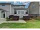 Backyard featuring a storage shed and lush landscaping in a well-maintained yard at 1891 Primrose Park Rd, Sugar Hill, GA 30518