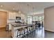 Well-lit kitchen with a large island, granite countertops, and stainless steel appliances at 1891 Primrose Park Rd, Sugar Hill, GA 30518
