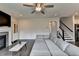 Open living room and staircase at 1891 Primrose Park Rd, Sugar Hill, GA 30518