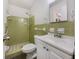 Bathroom featuring a vanity, toilet, and tiled shower and floor at 20 Shadow Creek Dr, Villa Rica, GA 30180