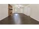 Spacious living room with a brick fireplace, modern floors and abundant natural light at 20 Shadow Creek Dr, Villa Rica, GA 30180