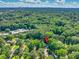 Aerial view of a wooded lot with location pin pointing to the house at 2648 Oswood Dr, Tucker, GA 30084