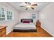 Cozy bedroom with ceiling fan, natural light and stylish furnishings at 2648 Oswood Dr, Tucker, GA 30084