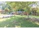Traditional brick home with a spacious front yard and mature landscaping at 2648 Oswood Dr, Tucker, GA 30084