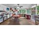 Bright sunroom with tile floor, natural light and versatile layout at 2648 Oswood Dr, Tucker, GA 30084
