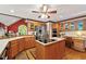 Beautiful kitchen with an island cooktop, stainless steel appliances, and a built-in desk area at 312 Crabapple Springs Way, Woodstock, GA 30188
