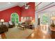 Bright living room showcasing hardwood floors, natural light, and open layout at 312 Crabapple Springs Way, Woodstock, GA 30188