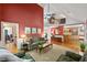 Inviting living room featuring high ceilings and hardwood floors, perfect for relaxing at 312 Crabapple Springs Way, Woodstock, GA 30188