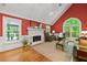 Cozy living room with fireplace, large windows, and comfortable seating at 312 Crabapple Springs Way, Woodstock, GA 30188