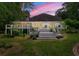 Expansive rear deck with multiple levels, ideal for entertaining and enjoying the landscaped backyard at 312 Crabapple Springs Way, Woodstock, GA 30188