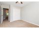 Bedroom featuring neutral paint, carpet, and closet at 112 Hawkeye Ln, Conyers, GA 30012