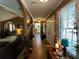 Inviting hallway with arched doorway, tiled floors, and decorative plants at 2671 Club Forest Se Ct, Conyers, GA 30013