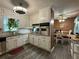 Bright kitchen featuring stainless steel appliances, ample cabinet space, and modern flooring at 2671 Club Forest Se Ct, Conyers, GA 30013