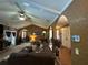 Bright living room featuring a brick fireplace and arched doorway at 2671 Club Forest Se Ct, Conyers, GA 30013