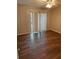 Spacious bedroom featuring wood floors, and a ceiling fan to maintain a comfortable home at 2751 Penwood Pl, Lithonia, GA 30058