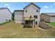 The backyard features a well maintained lawn, a deck with access to the home and a walkout basement at 3340 Ivey Rdg, Buford, GA 30519