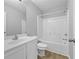 Well-lit bathroom featuring a vanity, toilet, and a shower-tub combo at 3340 Ivey Rdg, Buford, GA 30519