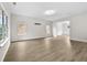 Spacious living room with new floors and lots of natural light, perfect for entertaining guests at 3340 Ivey Rdg, Buford, GA 30519
