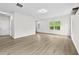 Bright living room featuring new floors and fresh paint providing an inviting space at 3340 Ivey Rdg, Buford, GA 30519