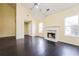 Spacious living room with fireplace, high ceilings, and elegant hardwood floors at 5867 Trent Walk Dr, Lithonia, GA 30038