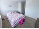 Cozy bedroom with plush carpet and ample space, perfect for relaxation at 82 Auburn Run Ln, Auburn, GA 30011